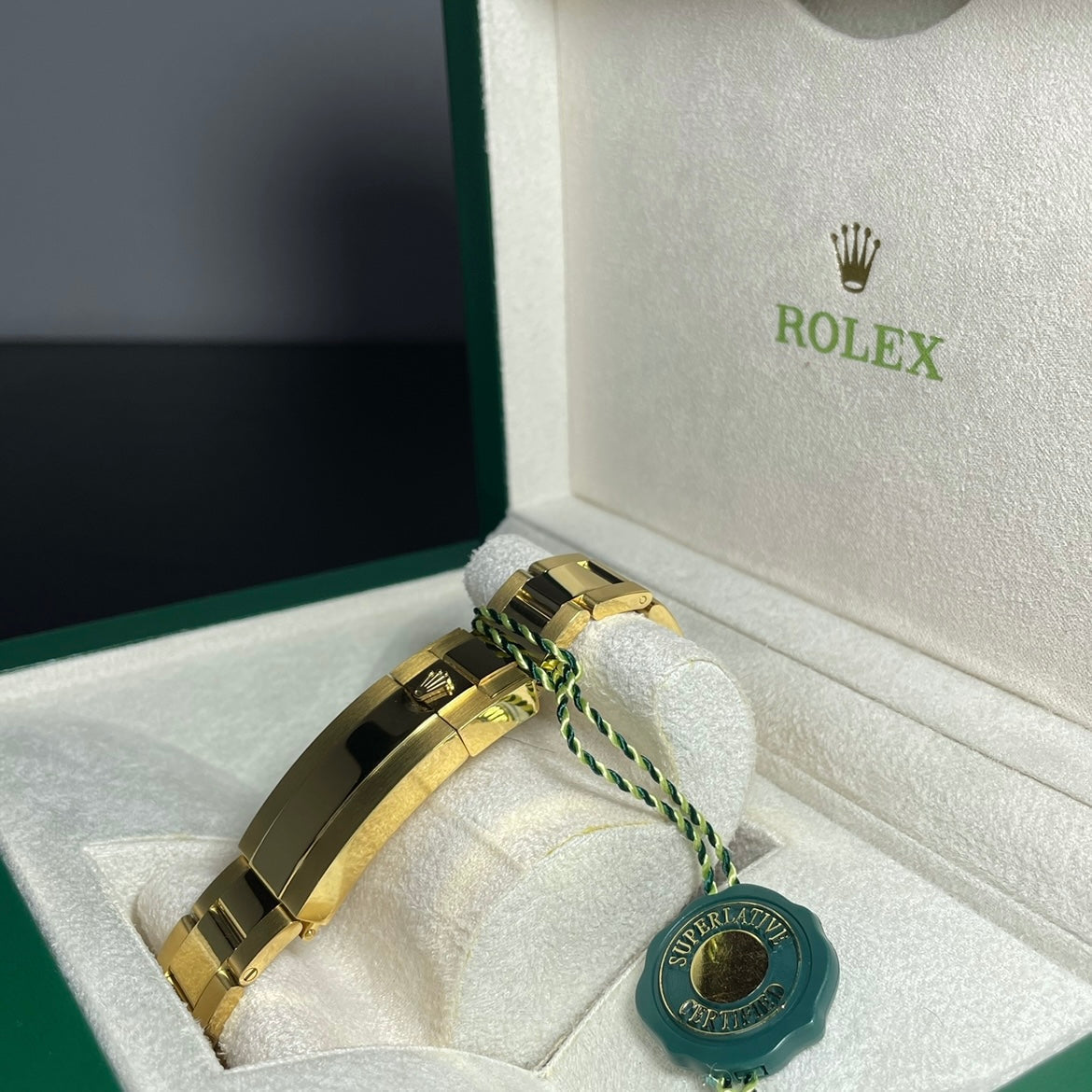 Orologio Rolex Daytona Green Gold 40 mm cinturino acciaio inox oro, presentato in scatola rolex.