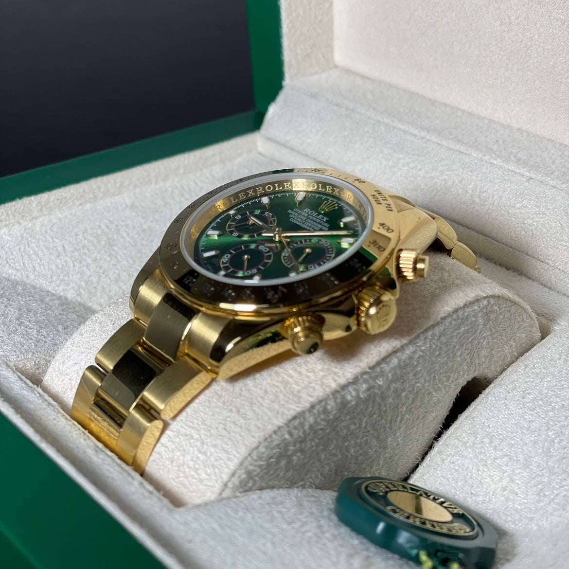 Orologio Rolex Daytona Green Gold 40 mm cinturino acciaio inox oro, presentato in scatola rolex.