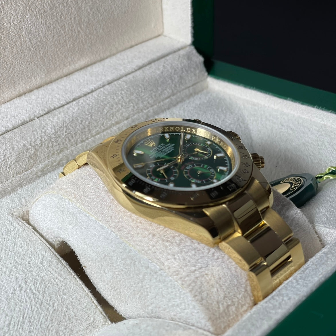 Orologio Rolex Daytona Green Gold 40 mm cinturino acciaio inox oro, presentato in scatola rolex.